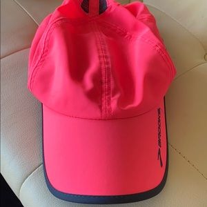 Neon pink Brooks cap